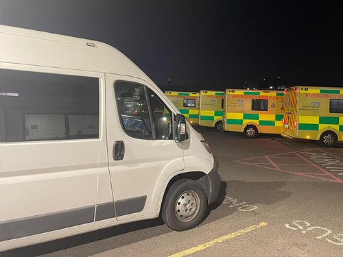 Secure Mental Health Transport ambulance outside Norfolk and Norwich University Hospital (NNUH) at night